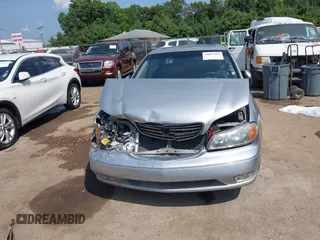 2002 Infiniti I35 Luxury with VIN JNKDA31A12T013489, listed as a IAAI auction lot 40095965 with 0 mi miles. Bid and sale history available at carsss.com. Image 12.