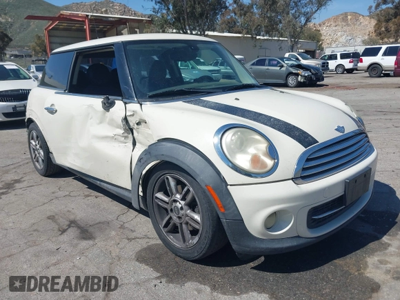 2011 MINI Hardtop with VIN WMWSU3C53BTX97140, listed as a IAAI auction lot 41861648 with 111,899 mi miles and . Bid and sale history available at DreamBid. Image 1.