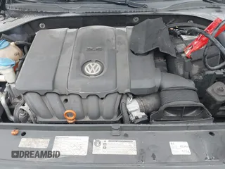 2013 Volkswagen Passat SEL Premium z VIN 1VWCH7A37DC056381, wystawiony jako IAAI lot #42426144 z przebiegiem 261 626 mil mil oraz . Historia ofert i sprzedaży dostępna na DreamBid. Obrazek 10.