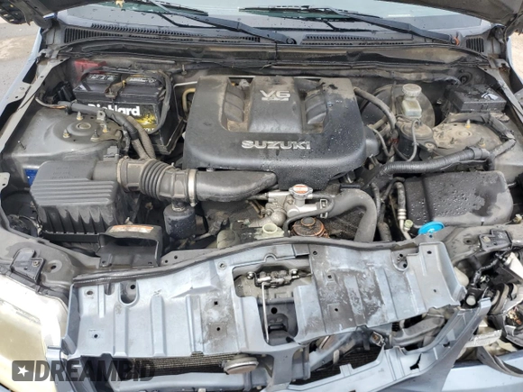 2006 Suzuki Grand Vitara Luxury z VIN JS3TE947164101951, wystawiony jako Copart lot #70110914 z przebiegiem 304 718 mil mil oraz Szkoda całkowita • Salvage title. Historia ofert i sprzedaży dostępna na DreamBid. Obrazek 12.