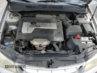 2004 Kia Spectra LX with VIN KNAFE121245031019, listed as a Copart auction lot 52960135 with 183,016 mi miles and Salvage Title. Bid and sale history available at carsss.com. Image 11.