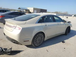 2016 Lincoln MKZ z VIN 3LN6L2G99GR610812, wystawiony jako Copart lot #52916045 z przebiegiem 181 235 mil mil oraz Szkoda całkowita • Salvage title. Historia ofert i sprzedaży dostępna na DreamBid. Obrazek 3.