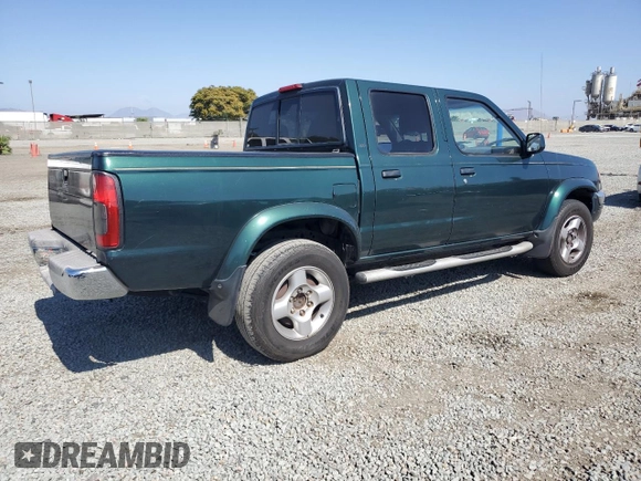 2000 Nissan Frontier XE with VIN 1N6ED27T0YC364061, listed as a Copart auction lot 61863515 with 226,867 mi miles and Clean title. Bid and sale history available at DreamBid. Image 3.