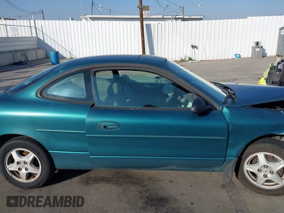 1998 Ford Escort z VIN 3FALP1138WR100529, wystawiony jako IAAI lot #41038021 z przebiegiem 214 877 mil mil oraz . Historia ofert i sprzedaży dostępna na DreamBid. Obrazek 13.