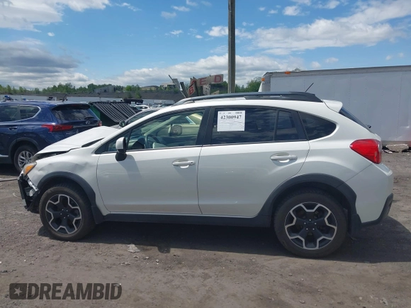 2014 Subaru Crosstrek Premium z VIN JF2GPAWC0E8320818, wystawiony jako IAAI lot #42300947 z przebiegiem 143 077 mil mil oraz . Historia ofert i sprzedaży dostępna na DreamBid. Obrazek 14.