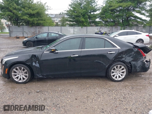 2014 Cadillac CTS AWD z VIN 1G6AW5SX4E0129136, wystawiony jako IAAI lot #42364098 z przebiegiem 137 080 mil mil oraz . Historia ofert i sprzedaży dostępna na DreamBid. Obrazek 14.