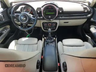 2016 MINI Clubman z VIN WMWLN5C5XG2E29275, wystawiony jako Copart lot #68162014 z przebiegiem 79 754 mil mil oraz Nie do naprawy. Historia ofert i sprzedaży dostępna na DreamBid. Obrazek 8.