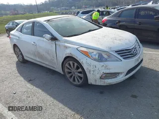 2014 Hyundai Azera Limited with VIN KMHFH4JG8EA390171, listed as a IAAI auction lot 41844326 with 159,884 mi miles and . Bid and sale history available at carsss.com. Image 1.