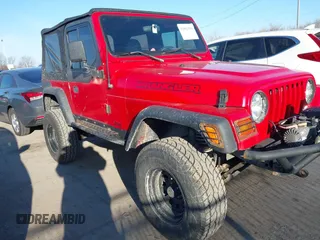 1997 Jeep Wrangler SE z VIN 1J4FY29PXVP476036, wystawiony jako IAAI lot #41882559 z przebiegiem 82 888 mil mil oraz . Historia ofert i sprzedaży dostępna na DreamBid. Obrazek 13.