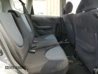 2007 Honda Fit z VIN JHMGD38497S025472, wystawiony jako Copart lot #55901095 z przebiegiem 120 216 mil mil oraz Szkoda całkowita • Salvage title. Historia ofert i sprzedaży dostępna na DreamBid. Obrazek 10.