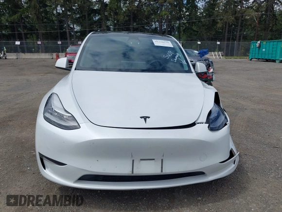 2022 Tesla Model Y Long Range z VIN 7SAYGDEE9NF494901, wystawiony jako IAAI lot #42310520 z przebiegiem 62 515 mil mil oraz . Historia ofert i sprzedaży dostępna na DreamBid. Obrazek 12.