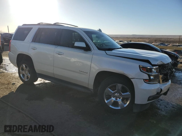 2015 Chevrolet Tahoe LT with VIN 1GNSCBKC2FR738042, listed as a Copart auction lot 84856214 with 144,325 mi miles and Salvage title. Bid and sale history available at DreamBid. Image 4.