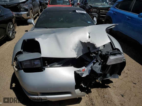 1999 Chevrolet Corvette with VIN 1G1YY22G7X5118599, listed as a Copart auction lot 56498334 with 0 mi miles and Salvage Title. Bid and sale history available at carsss.com. Image 5.