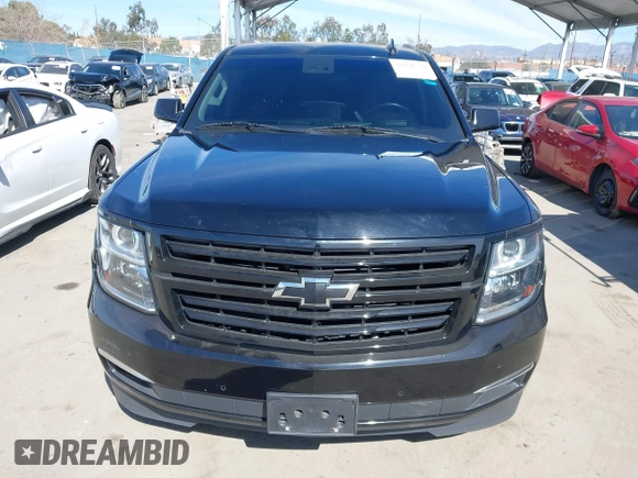 2019 Chevrolet Suburban LT with VIN 1GNSCJKCXKR332739, listed as a IAAI auction lot 41636530 with 104,997 mi miles and . Bid and sale history available at DreamBid. Image 12.