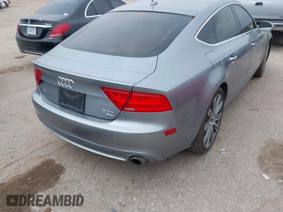 2013 Audi A7 Premium Plus with VIN WAUYGAFC1DN069906, listed as a IAAI auction lot 41906962 with 203,149 mi miles and . Bid and sale history available at DreamBid. Image 4.