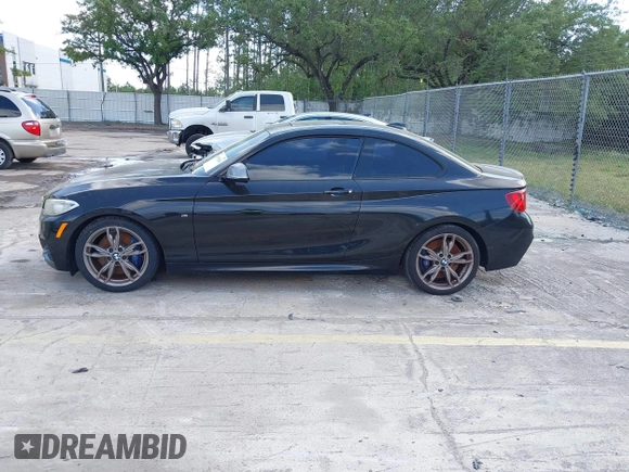 2014 BMW 2 Series M235i with VIN WBA1J7C50EVW84072, listed as a IAAI auction lot 41917841 with 102,745 mi miles and . Bid and sale history available at carsss.com. Image 14.