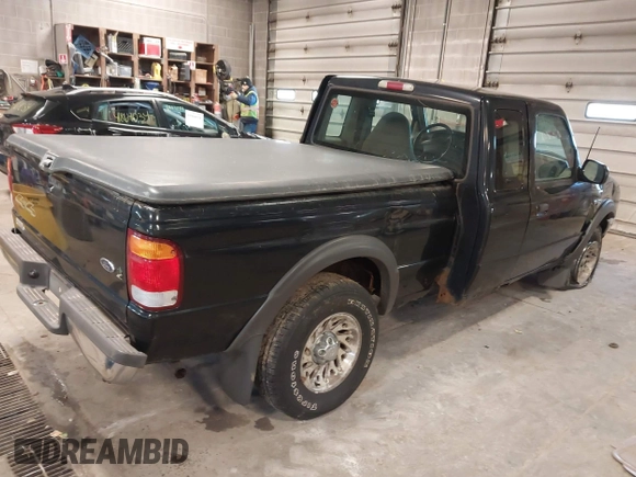 1999 Ford Ranger XL with VIN 1FTZR15V4XPB56809, listed as a IAAI auction lot 41874991 with 165,487 mi miles. Bid and sale history available at carsss.com. Image 4.
