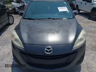 2015 Mazda 5 Sport with VIN JM1CW2BL7F0183114, listed as a IAAI auction lot 42409805 with 174,606 mi miles and . Bid and sale history available at DreamBid. Image 6.