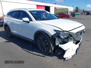 2020 Mazda CX-9 Signature with VIN JM3TCBEY3L0418322, listed as a IAAI auction lot 41723991 with 57,325 mi miles and . Bid and sale history available at carsss.com. Image 1.