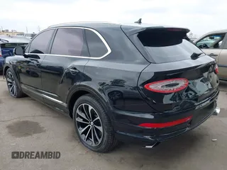 2022 Bentley Bentayga V8 z VIN SJAAM2ZV1NC013849, wystawiony jako IAAI lot #42176939 z przebiegiem 15 292 mil mil oraz . Historia ofert i sprzedaży dostępna na DreamBid. Obrazek 3.
