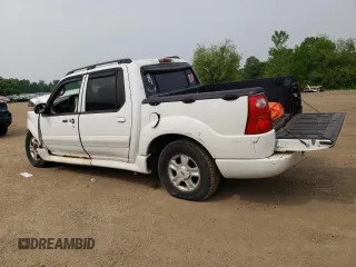 2005 Ford Explorer Sport Trac XLS with VIN 1FMZU77K75UB56611, listed as a Copart auction lot 60622925 with 157,063 mi miles and Salvage title. Bid and sale history available at DreamBid. Image 2.