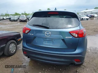 2016 Mazda CX-5 Touring z VIN JM3KE2CY3G0728968, wystawiony jako IAAI lot #42189174 z przebiegiem 145 977 mil mil oraz . Historia ofert i sprzedaży dostępna na DreamBid. Obrazek 17.