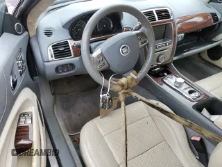 2011 Jaguar XK with VIN SAJWA4GB9BLB41127, listed as a Copart auction lot 75502694 with 0 mi miles and Salvage Title. Bid and sale history available at carsss.com. Image 8.