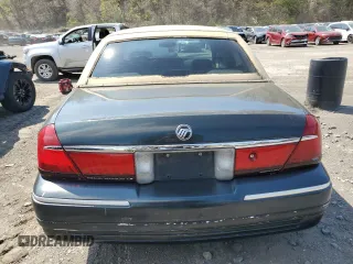 1999 Mercury Grand Marquis LS with VIN 2MEFM75W0XX731008, listed as a Copart auction lot 54375795 with 88,080 mi miles and Salvage Title. Bid and sale history available at DreamBid. Image 6.