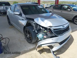 2014 Kia Optima LX z VIN 5XXGM4A79EG320493, wystawiony jako IAAI lot #42346332 z przebiegiem 136 439 mil mil oraz . Historia ofert i sprzedaży dostępna na DreamBid. Obrazek 1.