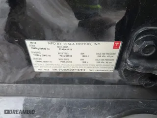 2015 Tesla Model S 85D with VIN 5YJSA1E25FF107819, listed as a IAAI auction lot 41333556 with 141,066 mi miles. Bid and sale history available at carsss.com. Image 9.
