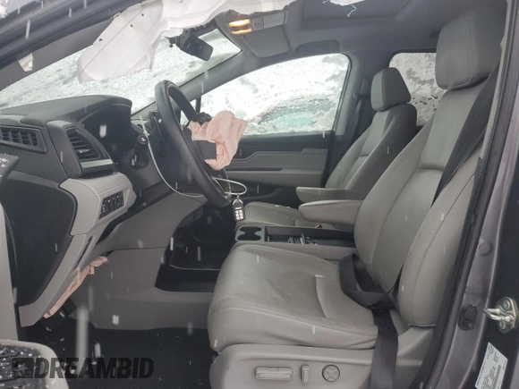 2020 Honda Odyssey EX-L z VIN 5FNRL6H60LB504967, wystawiony jako Copart lot #42021525 z przebiegiem Nie podano mil oraz Szkoda całkowita • Salvage title. Historia ofert i sprzedaży dostępna na DreamBid. Obrazek 7.