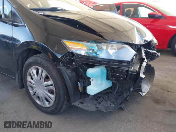 2010 Honda Insight LX with VIN JHMZE2H54AS021815, listed as a IAAI auction lot 42259951 with 137,436 mi miles and . Bid and sale history available at DreamBid. Image 13.