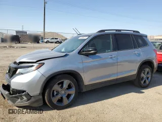 2020 Honda Passport Touring with VIN 5FNYF7H9XLB004348, listed as a Copart auction lot 63469474 with 51,030 mi miles and Salvage Title. Bid and sale history available at DreamBid. Image 1.