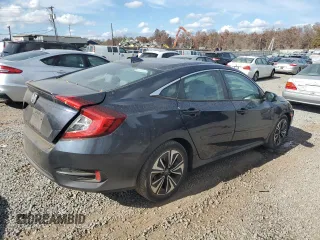 2017 Honda Civic EX-T with VIN 19XFC1E36HE019696, listed as a Copart auction lot 78123564 with 79,698 mi miles and Salvage Title. Bid and sale history available at DreamBid. Image 3.