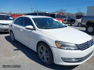 2012 Volkswagen Passat SE w/Sunroof with VIN 1VWBM7A3XCC101027, listed as a IAAI auction lot 41831935 with 199,352 mi miles. Bid and sale history available at carsss.com. Image 1.