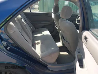 2002 Toyota Camry LE z VIN JTDBE32KX20111362, wystawiony jako IAAI lot #41820475 z przebiegiem 270 091 mil mil oraz . Historia ofert i sprzedaży dostępna na DreamBid. Obrazek 8.
