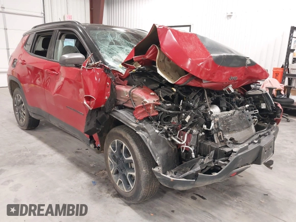 2021 Jeep Compass Trailhawk z VIN 3C4NJDDBXMT586981, wystawiony jako IAAI lot #42116028 z przebiegiem 70 317 mil mil oraz . Historia ofert i sprzedaży dostępna na DreamBid. Obrazek 1.