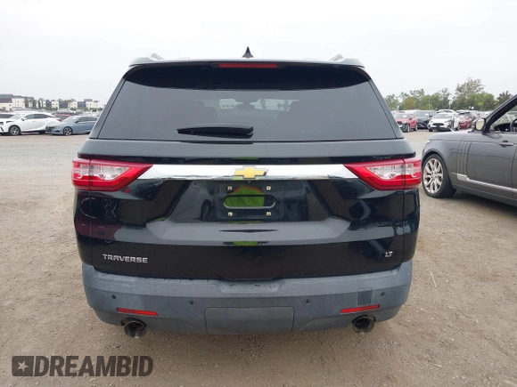 2018 Chevrolet Traverse LT Cloth z VIN 1GNERGKW4JJ127889, wystawiony jako IAAI lot #42368681 z przebiegiem 65 438 mil mil oraz . Historia ofert i sprzedaży dostępna na DreamBid. Obrazek 16.