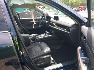 2018 Mazda CX-5 Grand Touring with VIN JM3KFBDM2J0373386, listed as a IAAI auction lot 42200795 with 70,111 mi miles and . Bid and sale history available at DreamBid. Image 5.