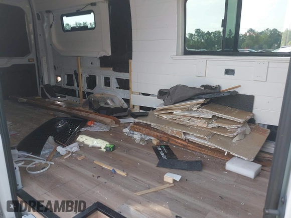 2022 Ford Transit Cargo с VIN 1FTBR3X87NKA74815, выставлен на аукционе IAAI как лот 42323910 с пробегом 57 064 миль миль и . История ставок и продаж доступна на DreamBid. Изображение 8.