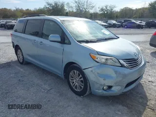 2015 Toyota Sienna XLE with VIN 5TDYK3DC0FS538951, listed as a IAAI auction lot 41894384 with 210,649 mi miles. Bid and sale history available at carsss.com. Image 1.