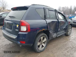 2016 Jeep Compass High Altitude Edition with VIN 1C4NJDEB0GD696124, listed as a IAAI auction lot 41973334 with 67,056 mi miles. Bid and sale history available at carsss.com. Image 4.
