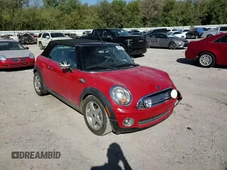 2009 MINI Convertible z VIN WMWMR335X9TU95073, wystawiony jako Copart lot #73690884 z przebiegiem 63 888 mil mil oraz Szkoda całkowita • Salvage title. Historia ofert i sprzedaży dostępna na DreamBid. Obrazek 11.