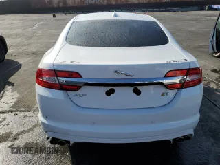 2013 Jaguar XF with VIN SAJWA8JC7DMS77243, listed as a Copart auction lot 77583544 with Not Provided miles and Salvage Title. Bid and sale history available at DreamBid. Image 6.