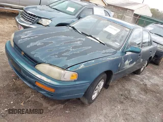 1996 Toyota Camry DX with VIN JT2BG12K1T0344507, listed as a IAAI auction lot 41832481 with 176,216 mi miles. Bid and sale history available at carsss.com. Image 2.