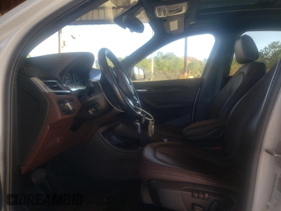 2017 BMW X1 sDrive28i with VIN WBXHU7C31H5H37217, listed as a Copart auction lot 70114342 with 73,683 mi miles. Bid and sale history available at carsss.com. Image 7.