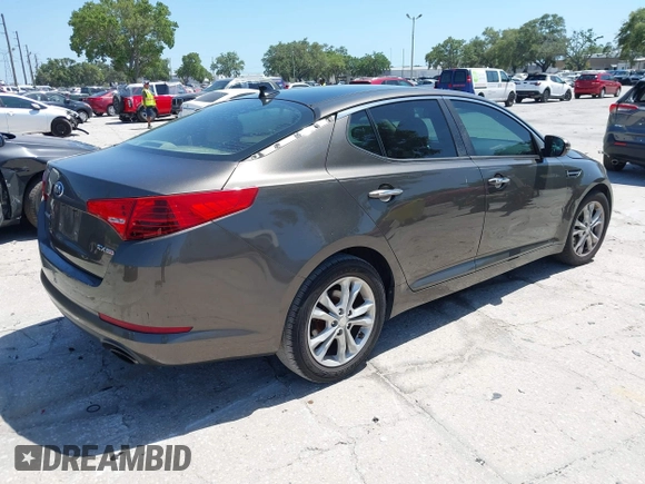2013 Kia Optima EX with VIN 5XXGN4A78DG220462, listed as a IAAI auction lot 42158221 with 152,637 mi miles and . Bid and sale history available at DreamBid. Image 4.