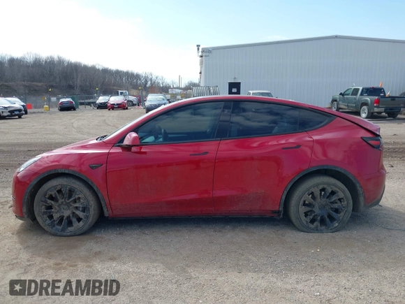 2023 Tesla Model Y Long Range with VIN 7SAYGDEE6PA157652, listed as a IAAI auction lot 41866777 with 22,584 mi miles. Bid and sale history available at carsss.com. Image 14.