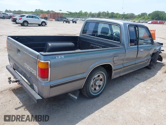 1992 Mazda B-Series Truck with VIN JM2UF313XN0306779, listed as a IAAI auction lot 42104583 with 137,826 mi miles and . Bid and sale history available at DreamBid. Image 4.