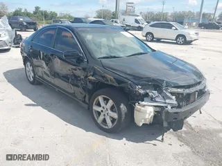 2009 Toyota Camry with VIN 4T1BE46K19U409247, listed as a IAAI auction lot 41624944 with 198,253 mi miles. Bid and sale history available at carsss.com. Image 1.